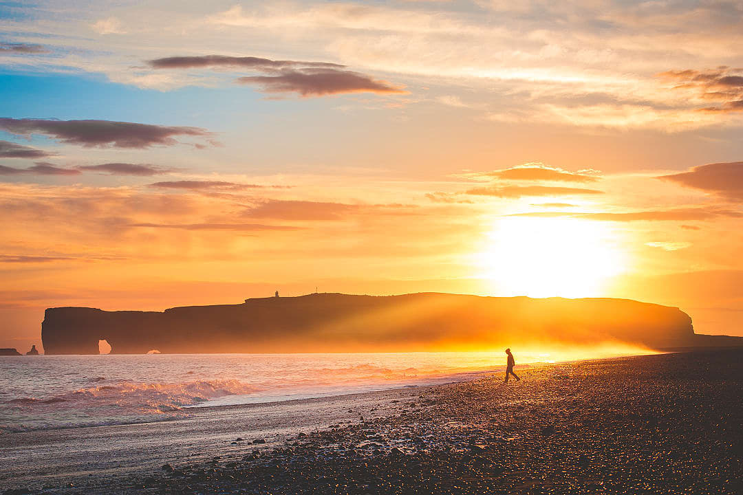 Dyrhólaey Beach at sunset in Iceland.
