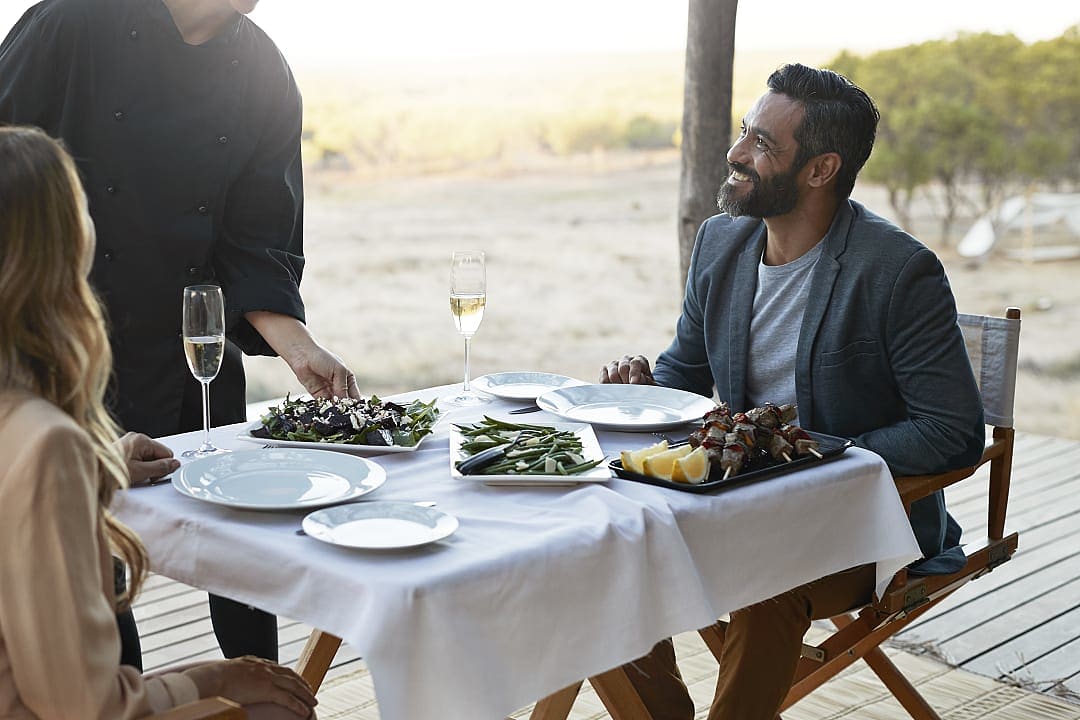 Couple enjoying a dinner in South Africa.