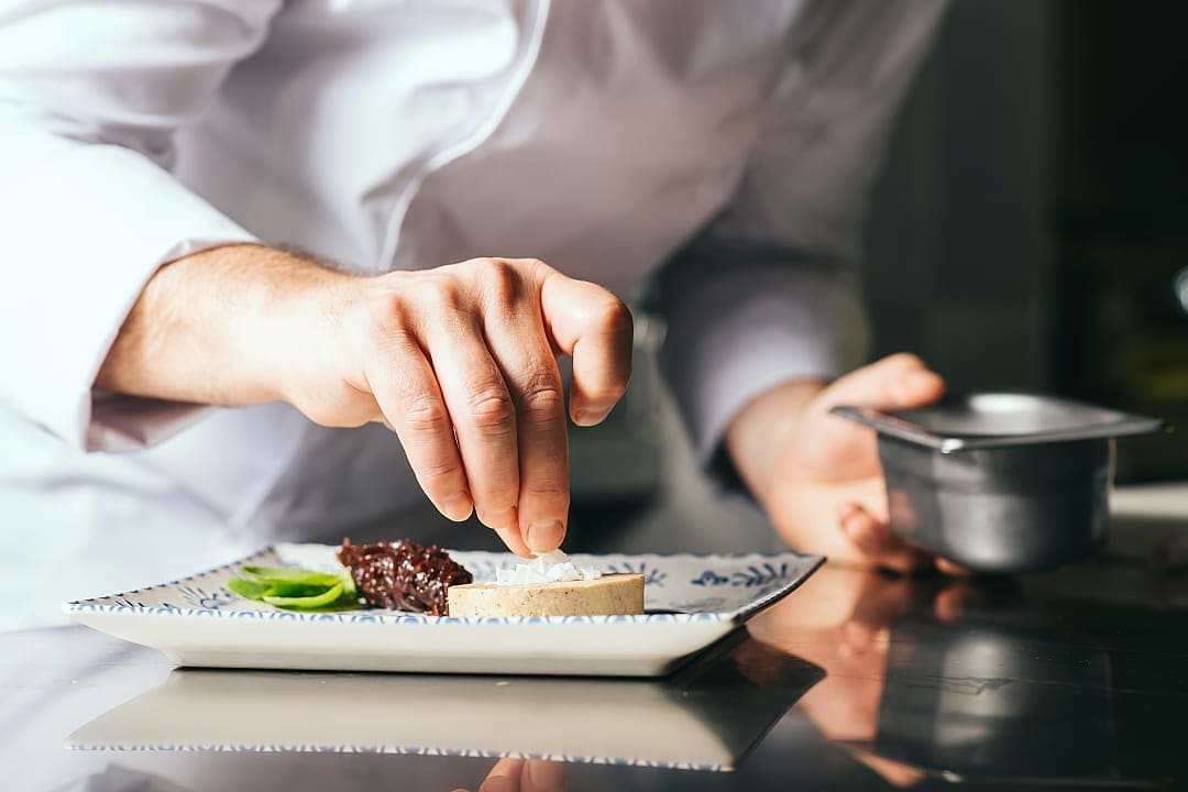 Chef preparing a traditional Foie Gras, Paris.