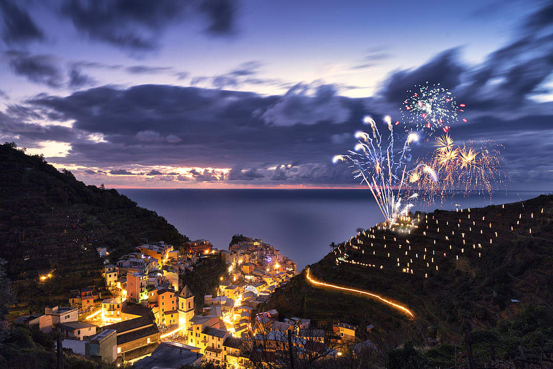 Fireworks across Cinque Terre, Liguria, Italy.