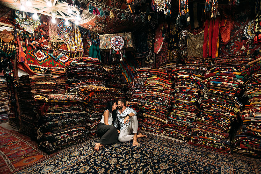 Couple at a rug shop in Fez Medina in Morocco