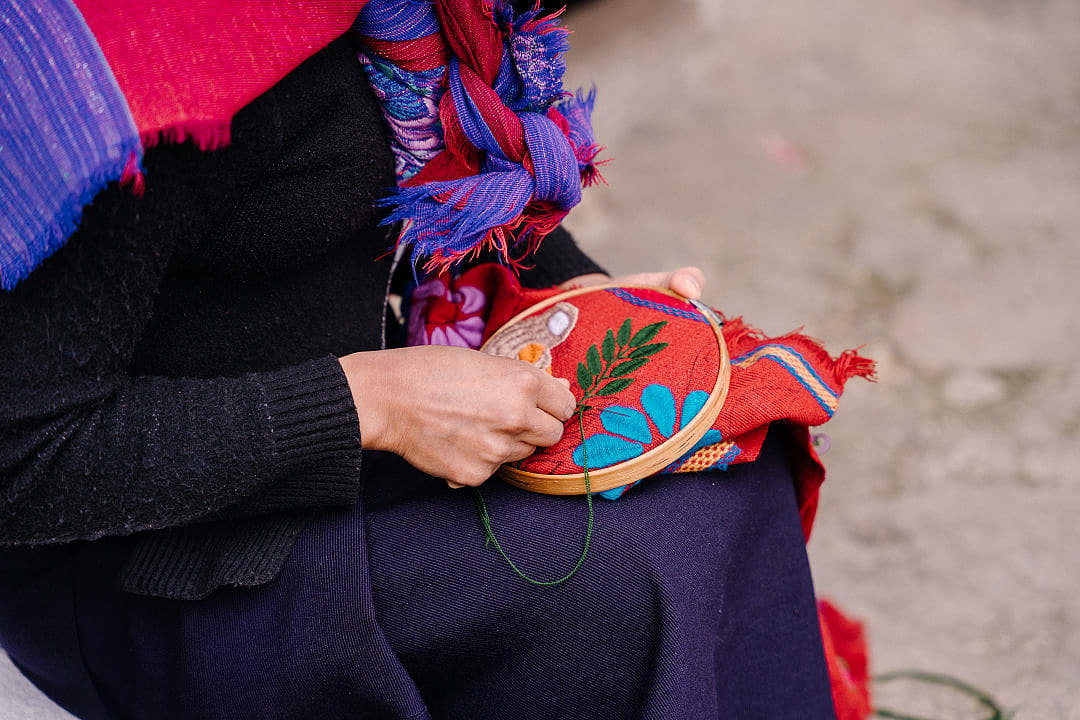 Indigenous woman embroidering