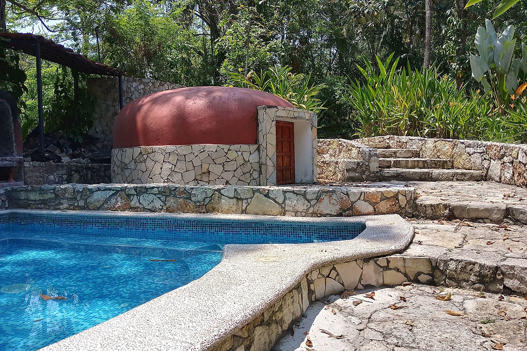 Temazcal next to the pool at a resort in Mexico