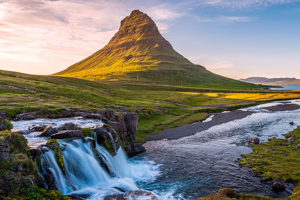 Kirkjufellsfoss and kirkjufell mountain in Iceland
