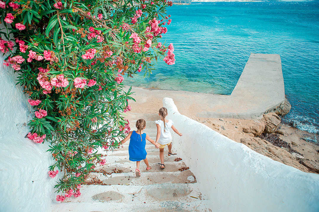 Children in Greece where experiences are more durable than a vacation.