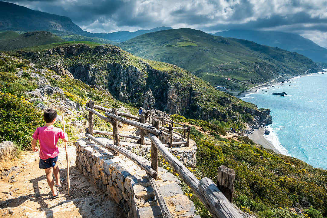 Child in Greece where mythology becomes a literal landscape to walk through.