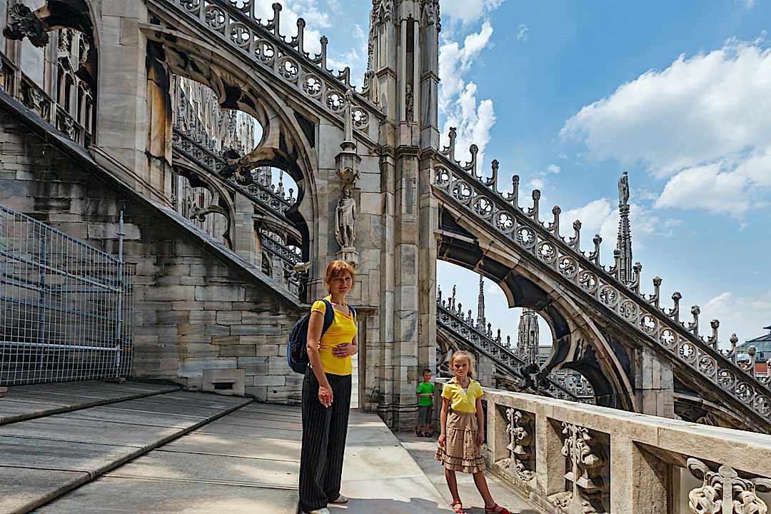 A family visits the Milan Cathedral.