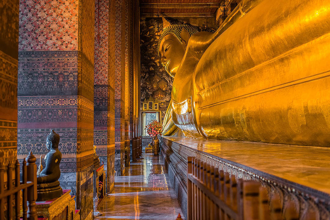 The Reclining Buddha inside Wat Pho Temple in Bangkok, Thailand.