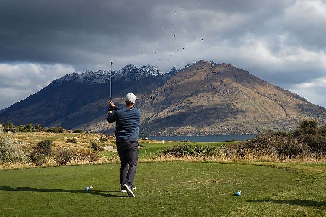 Enjoy a round of golf in Queenstown, New Zealand.
