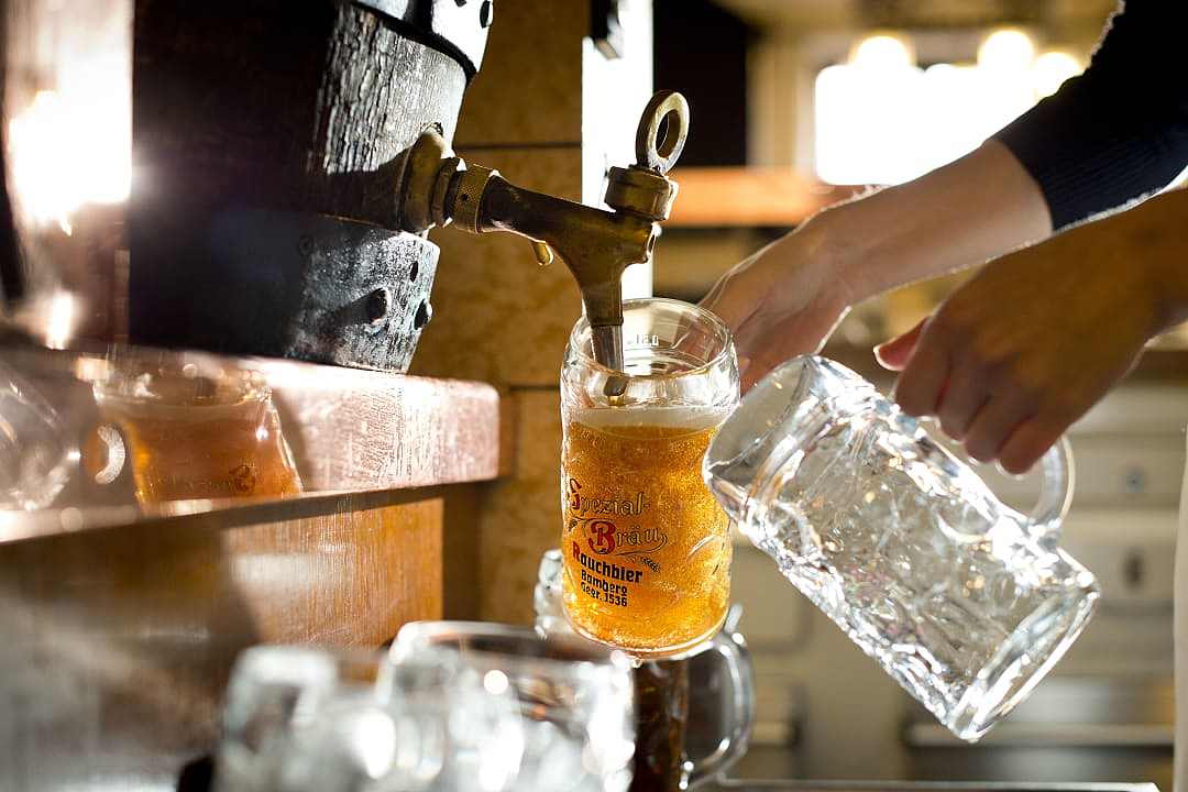 Freshly tapped beer from the barrel at a craft brewery in Bamberg, Germany