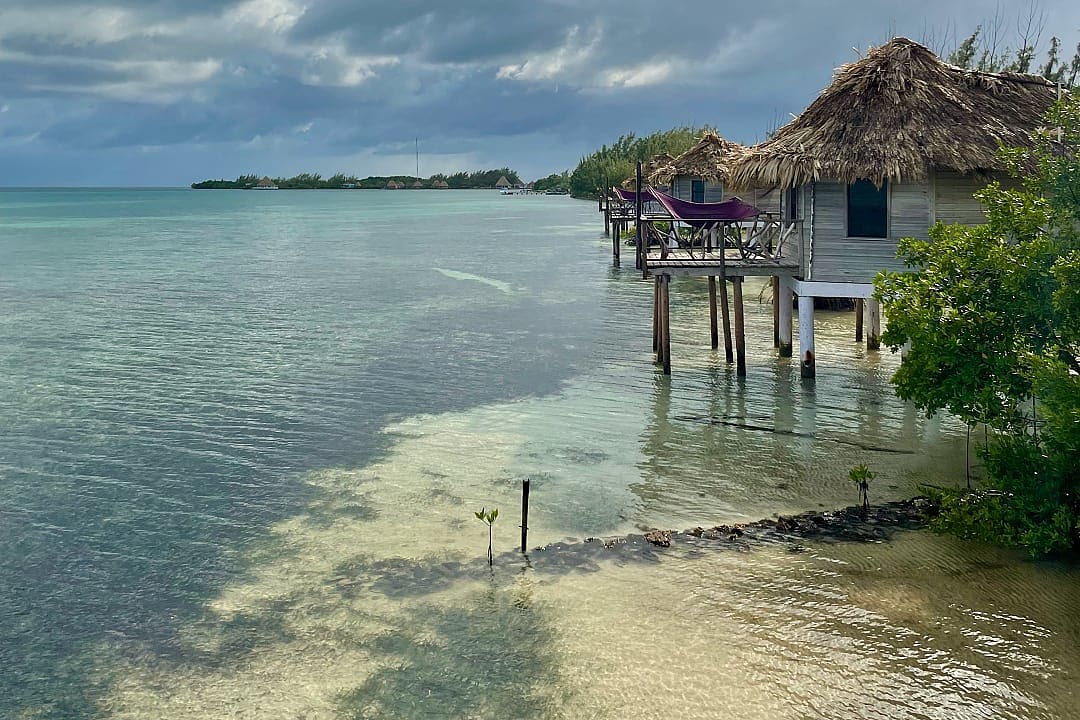 Overwater bungalows on Thatch Caye, Belize