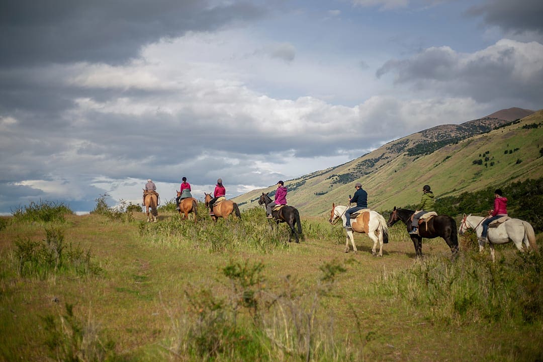Family horseback riding in El Calafate, Argentina