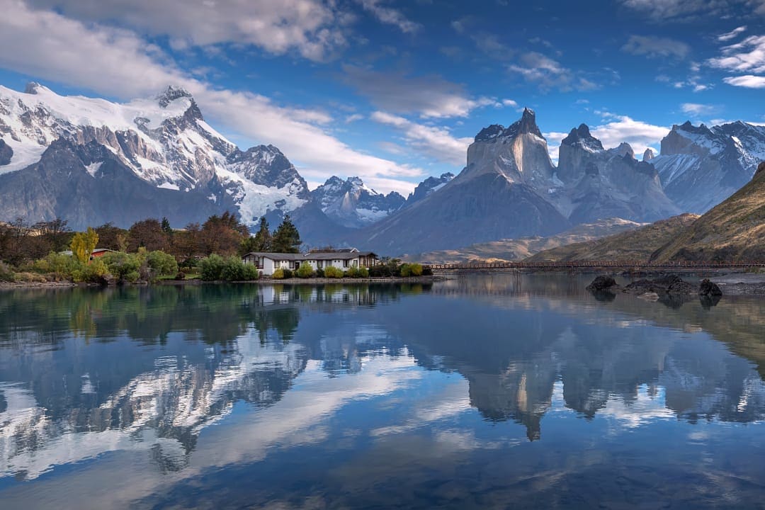 Jagged mountains and placid waters lake Pehoe in Torres del Paine National Park, Chile