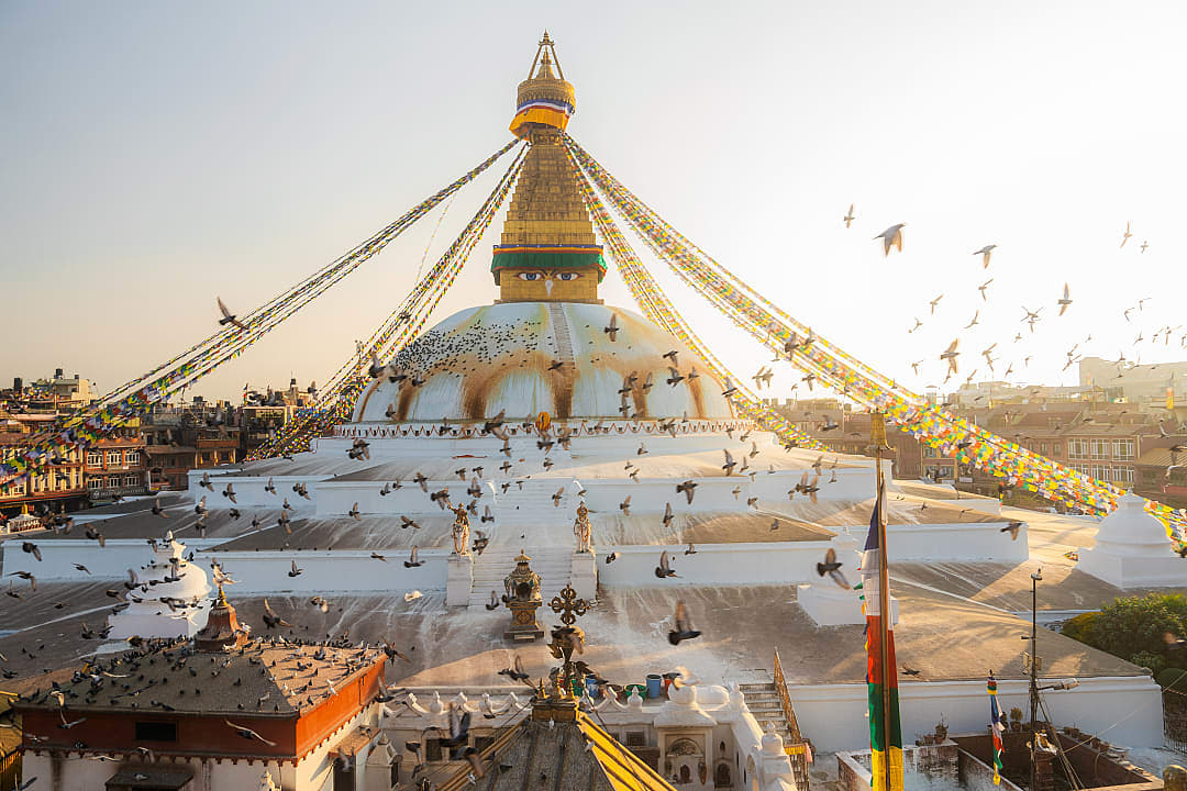 f Buddha stupa in Kathmandu, Nepal at sunset