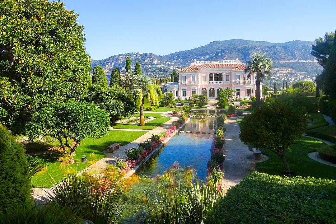 Elegant Villa Ephrussi de Rothschild with lush gardens and reflecting pool in Saint-Jean-Cap-Ferrat, France