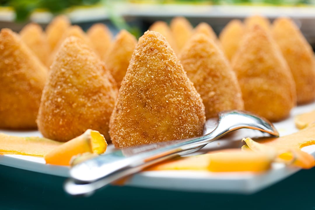 Arancini, deef fried stuffed rice balls, in Sicily, Italy