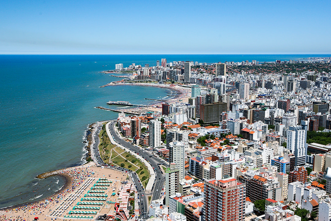 Aerial view of Mar del Plata, Argentina, showcasing its coastline, beaches, and city skyline.