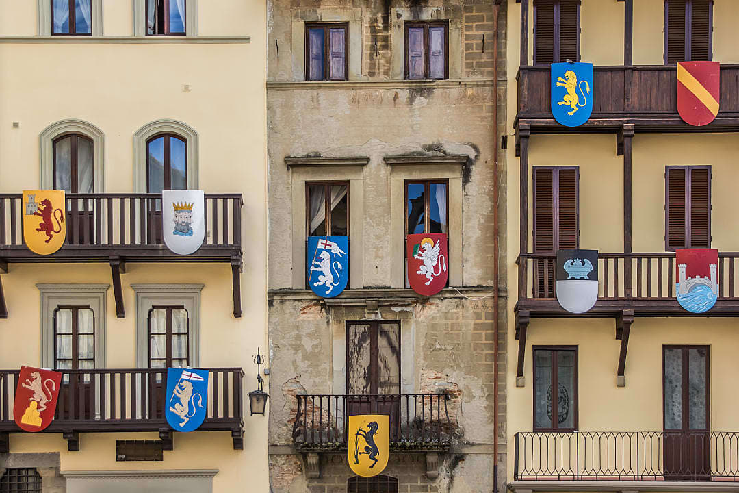 Medieval shields at the Piazza Grande in Arezzo, Italy