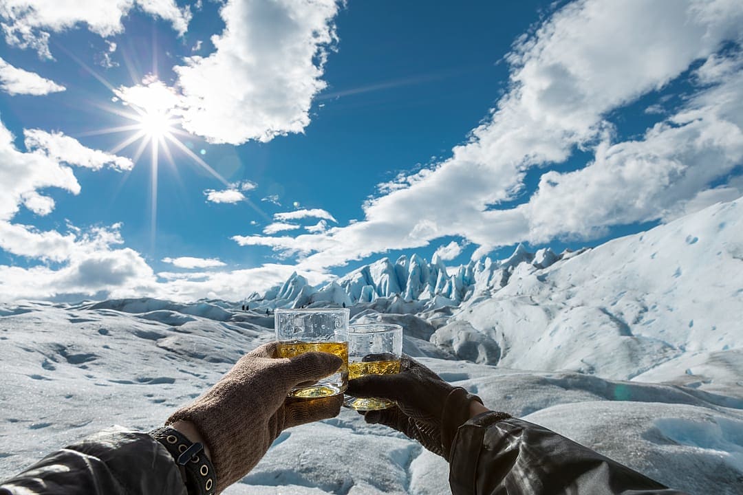 Whiskey toast at the Perito Moreno Glacier in Argentina