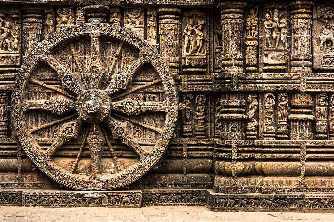 Carved chariot wheel on Konark Sun Temple in Odisha.