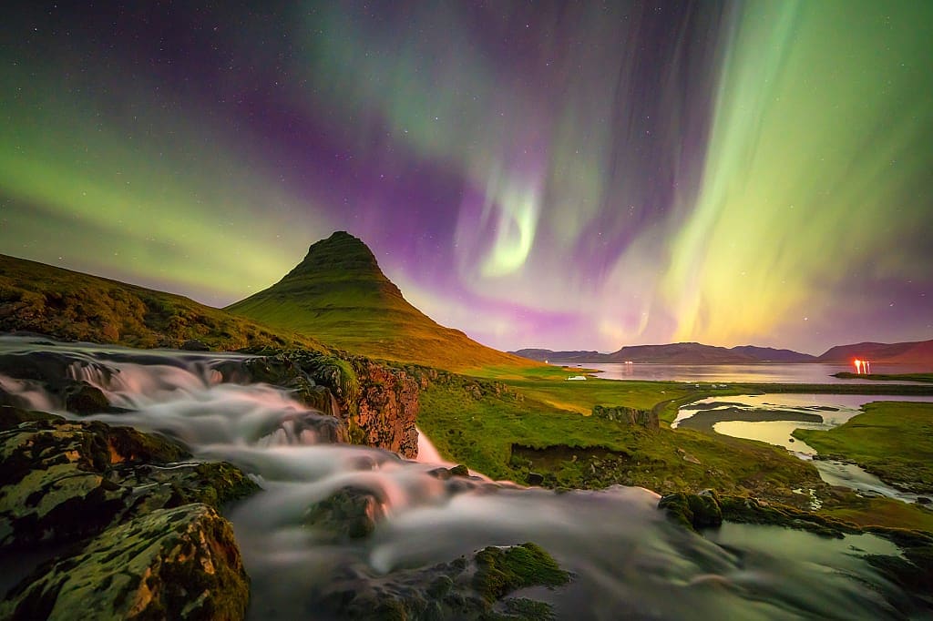 Northern lights over Mt. Kirkjufell and Kirkjufellsfoss in Iceland
