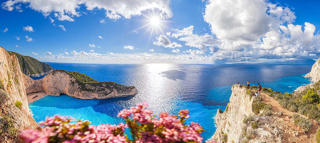 Navagio beach with shipwreck and flowers on Zakynthos island, Greece