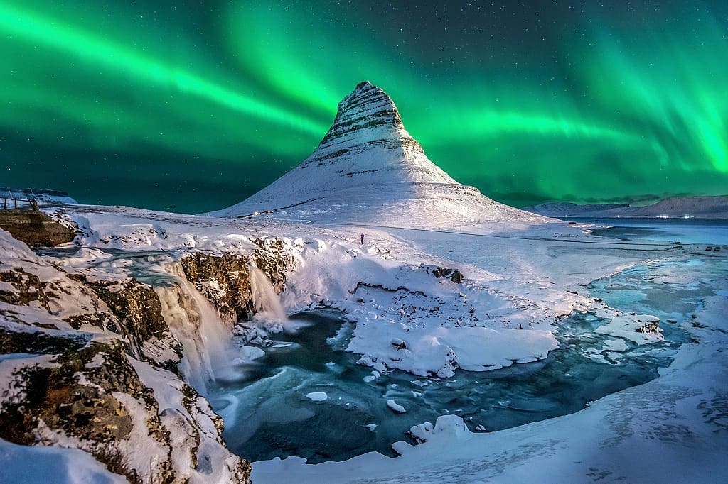 Northern lights over Mount Kirkjufell in Iceland