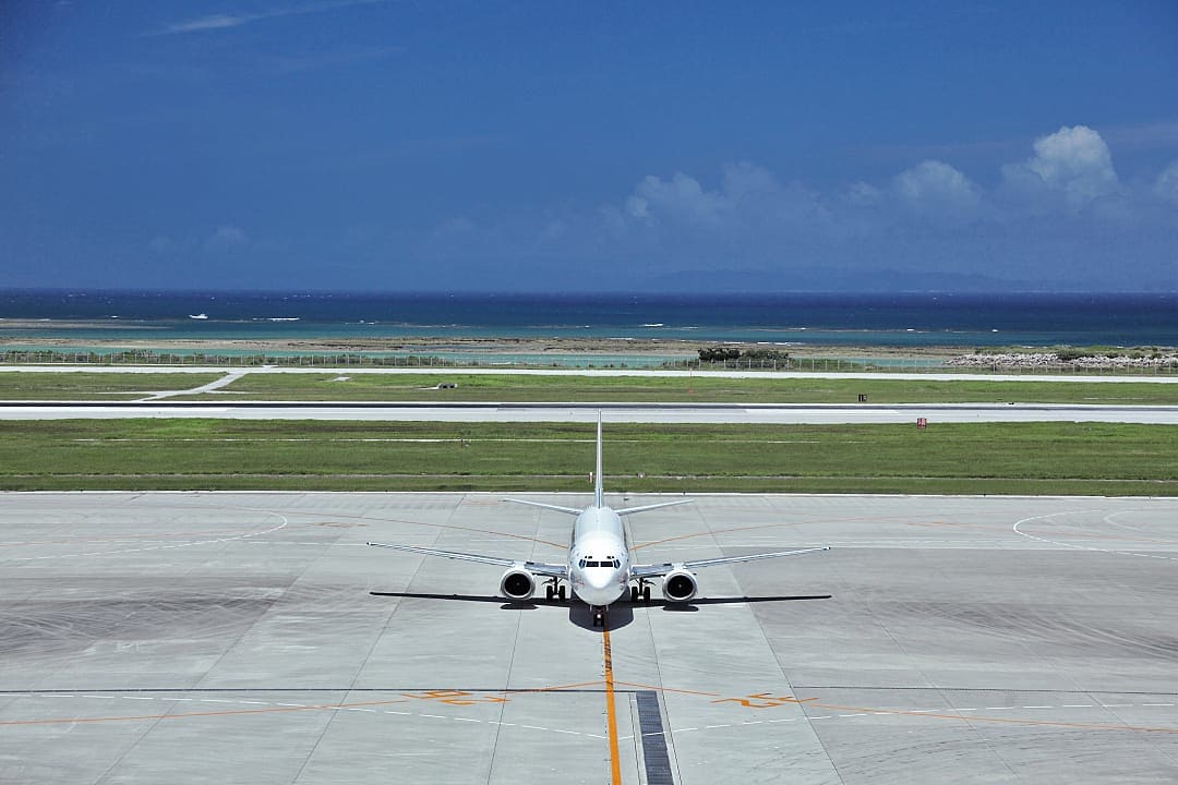 Plane taxiing at Naha Airport on Okinawa, Japan