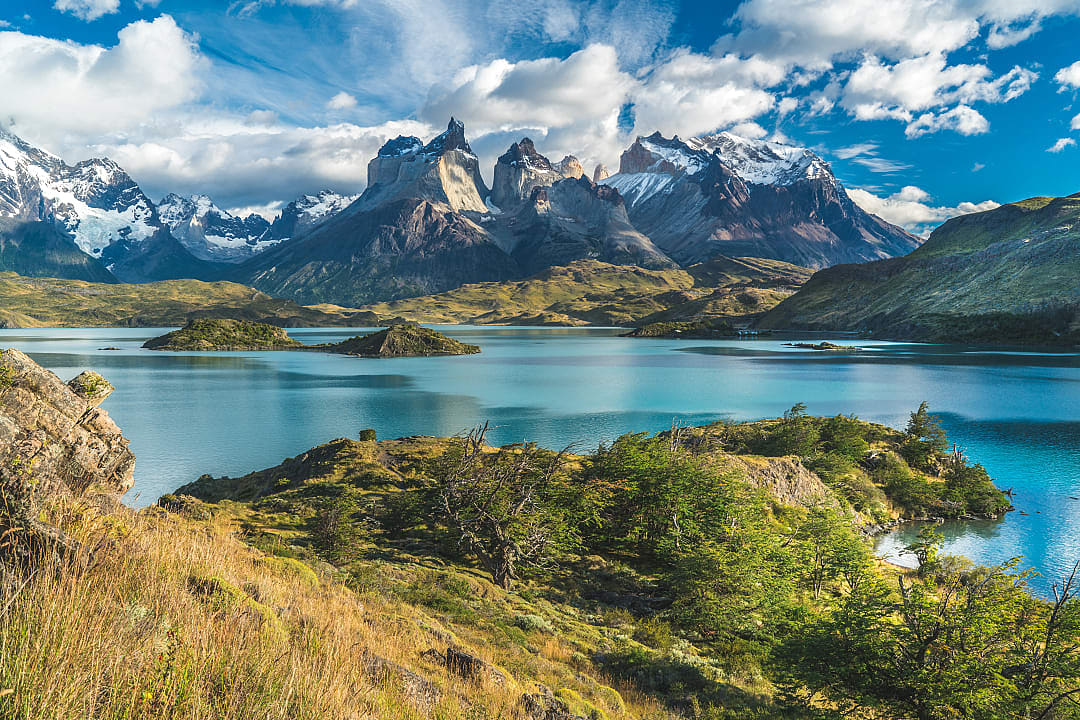 Blue lake on a snowy mountains in Torres del Paine, Chile