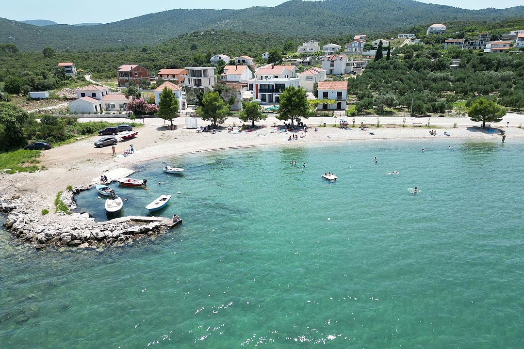 The village of Drače offers crystal-clear waters, scenic vineyards, and a tranquil escape on the Adriatic coast