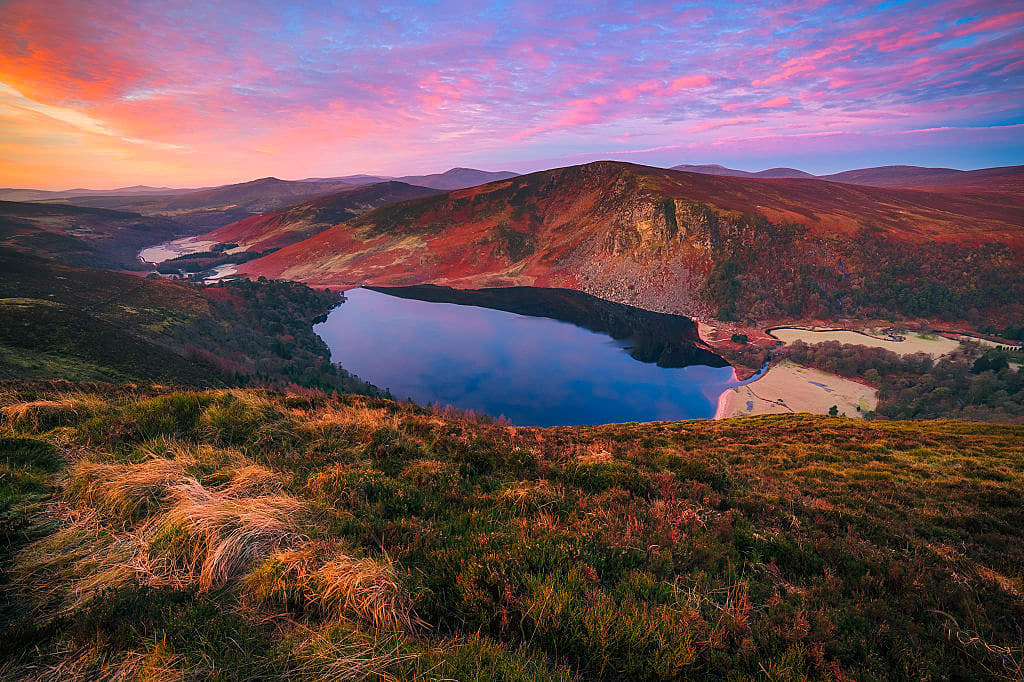 Autumn sunset over Lough Tay in the Wicklow mountains, Ireland