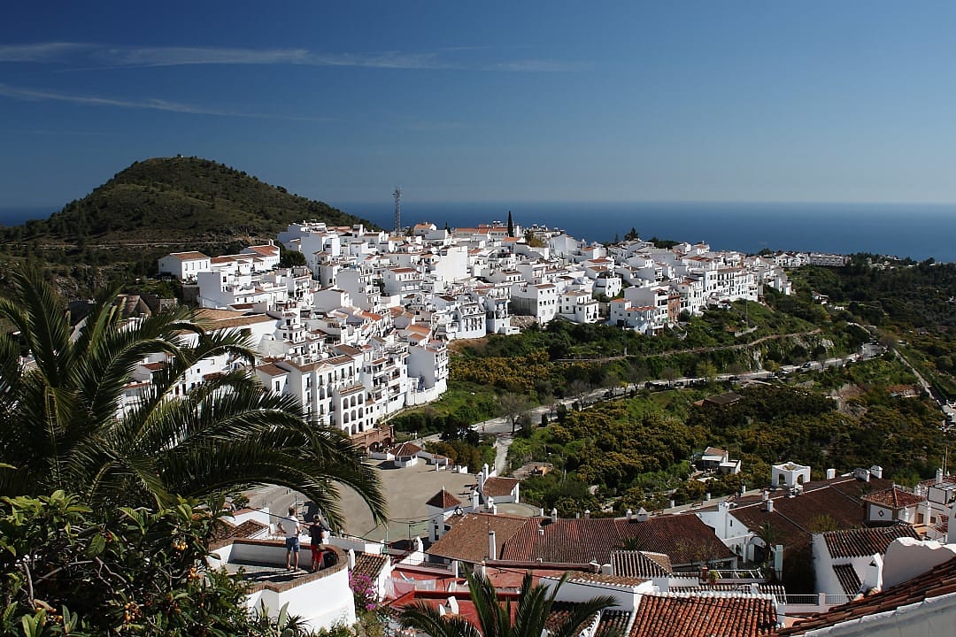 Picturesque view of Frigiliana, a charming white village in Andalusia, Spain, overlooking the Mediterranean
