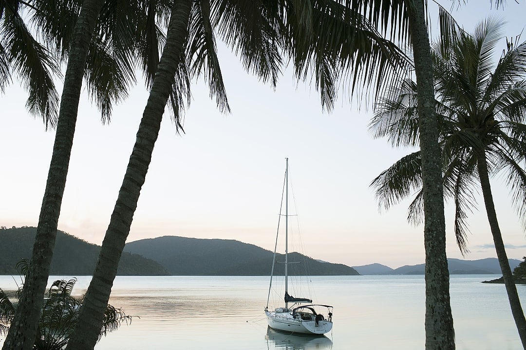 Sailing yacht anchored in bay, Queensland.