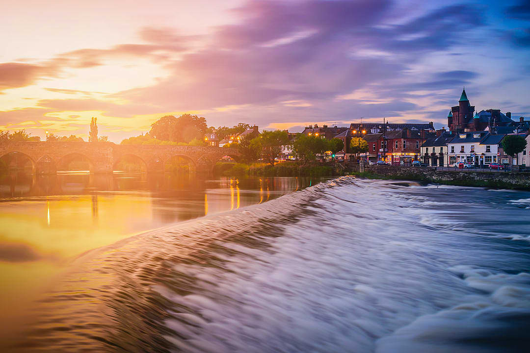 River Nith and old bridge at sunset in Dumfries, Scotland