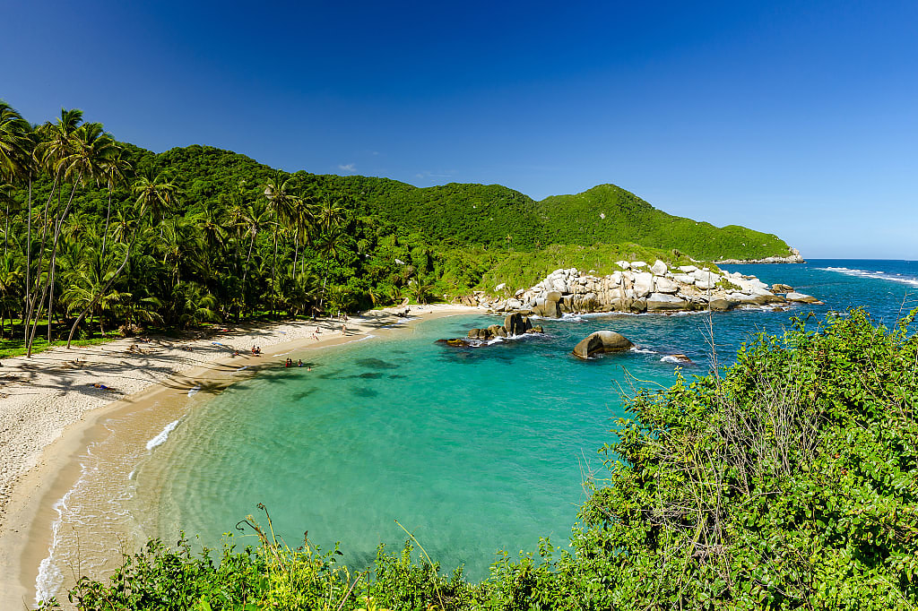 Clear turquoise water of San Juan del Guia beach in Tayrona National Park, Colombia