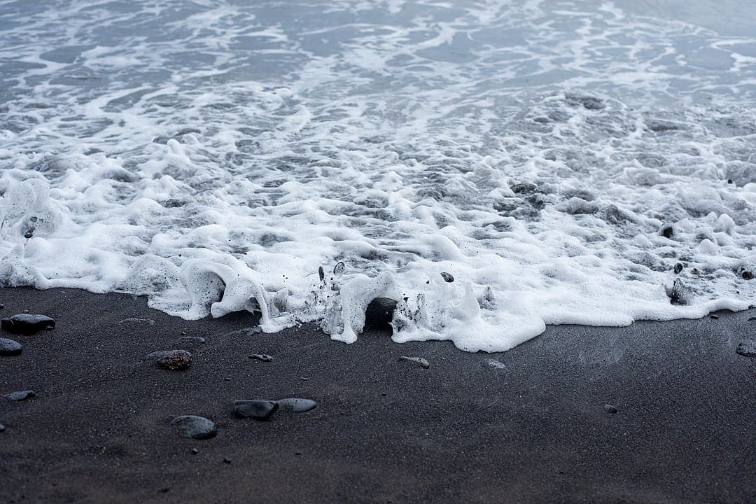 Black sand beach in Tahiti.