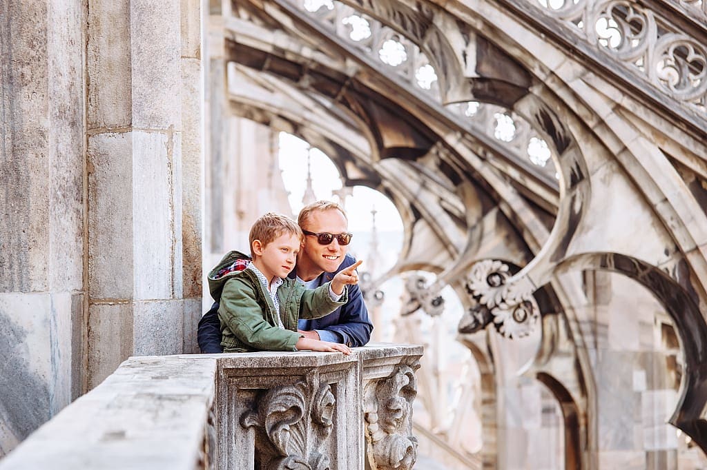 Father and son exploring Milan