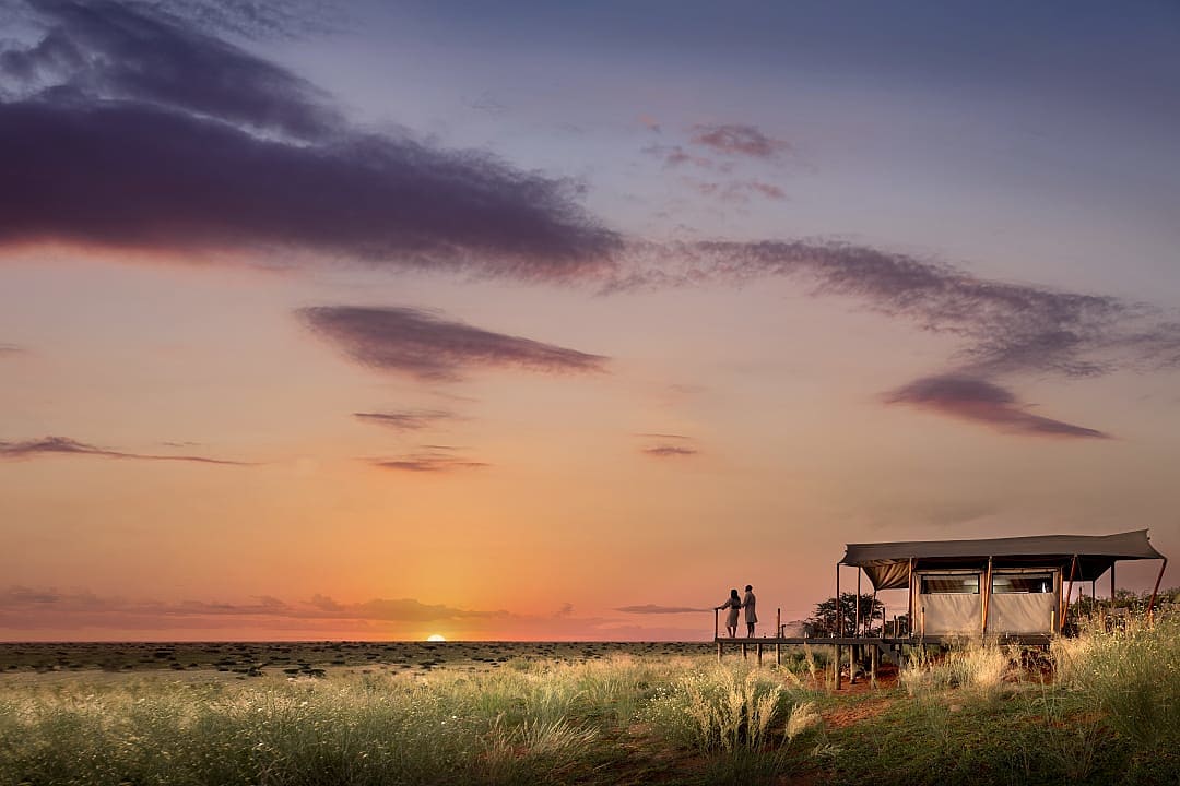 Couple watching the sunset, photo courtesy of Tswalu Kalahari.