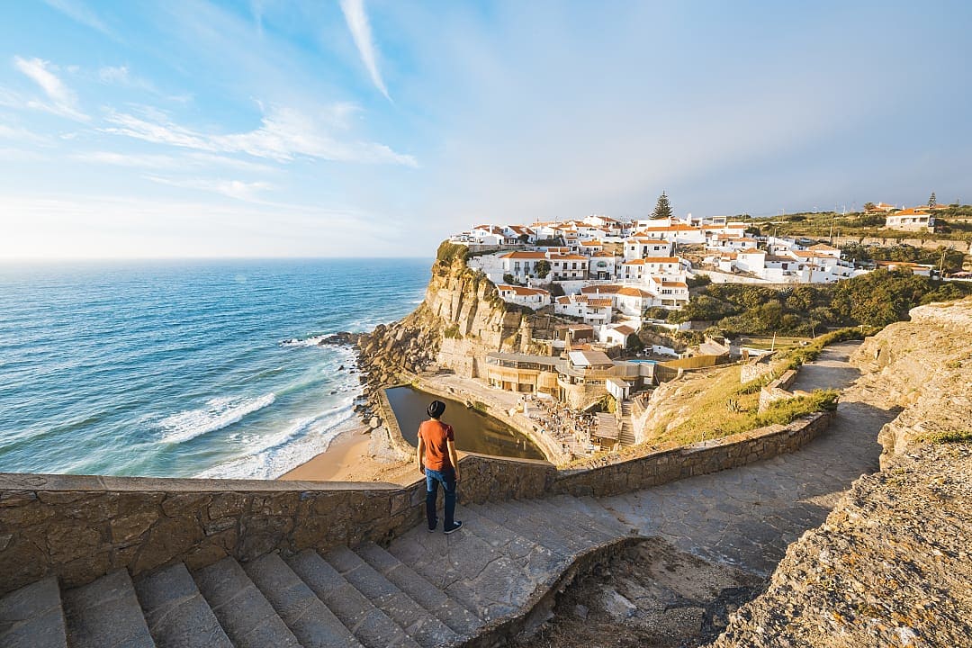 A traveller exploring the coast of Lisbon, Portugal.
