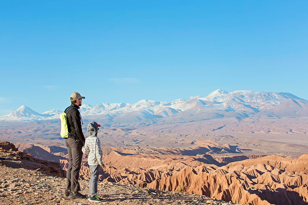 Father and son enjoying the view in Atacama in Chile