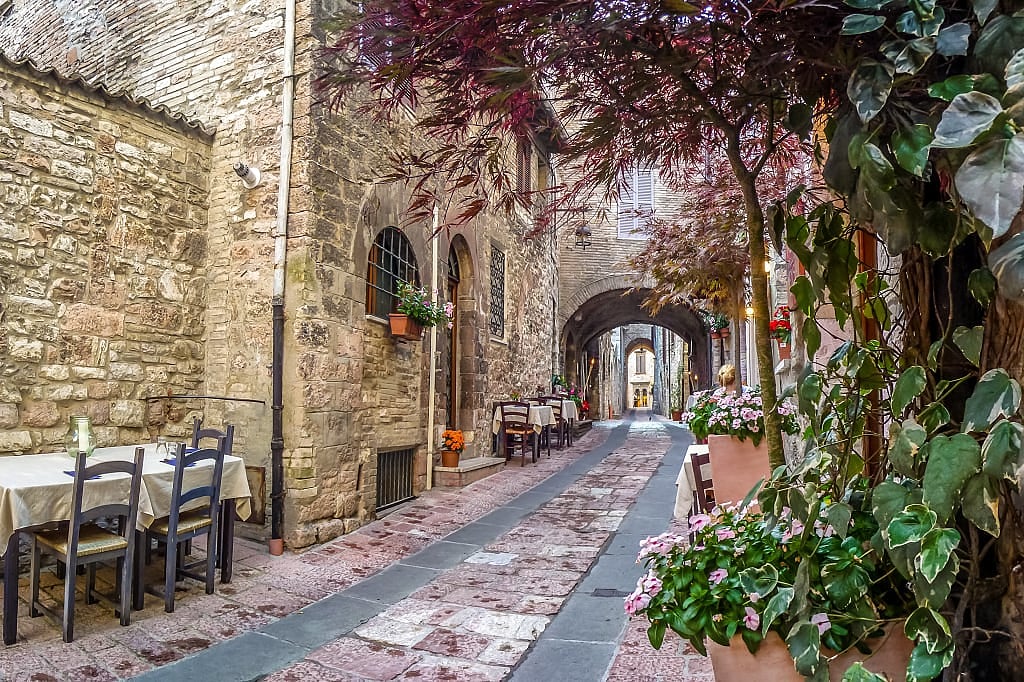 Alley with restaurants in Assisi