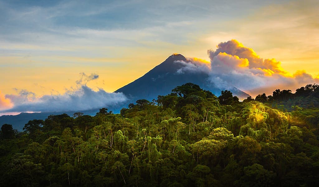 Arenal Volcano surrounded by lush rainforest in La Fortuna, Costa Rica