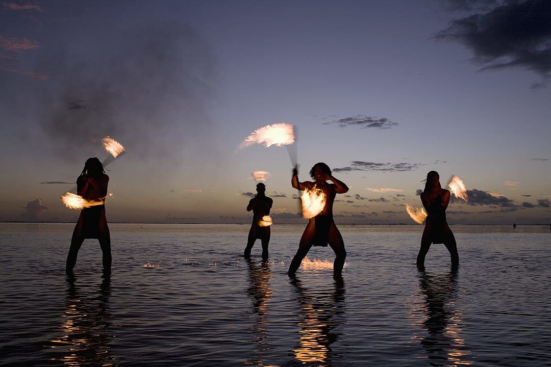 Fire dancers performing.