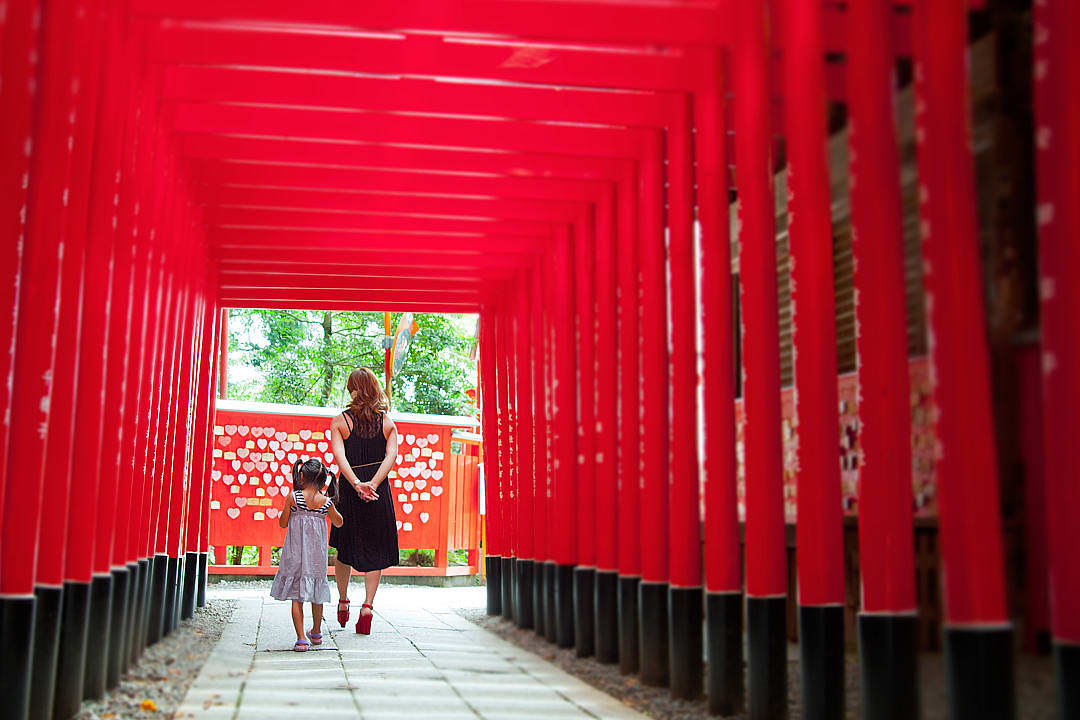 Mother and daughter at Fushimi Inari where photos rarely capture the moment.