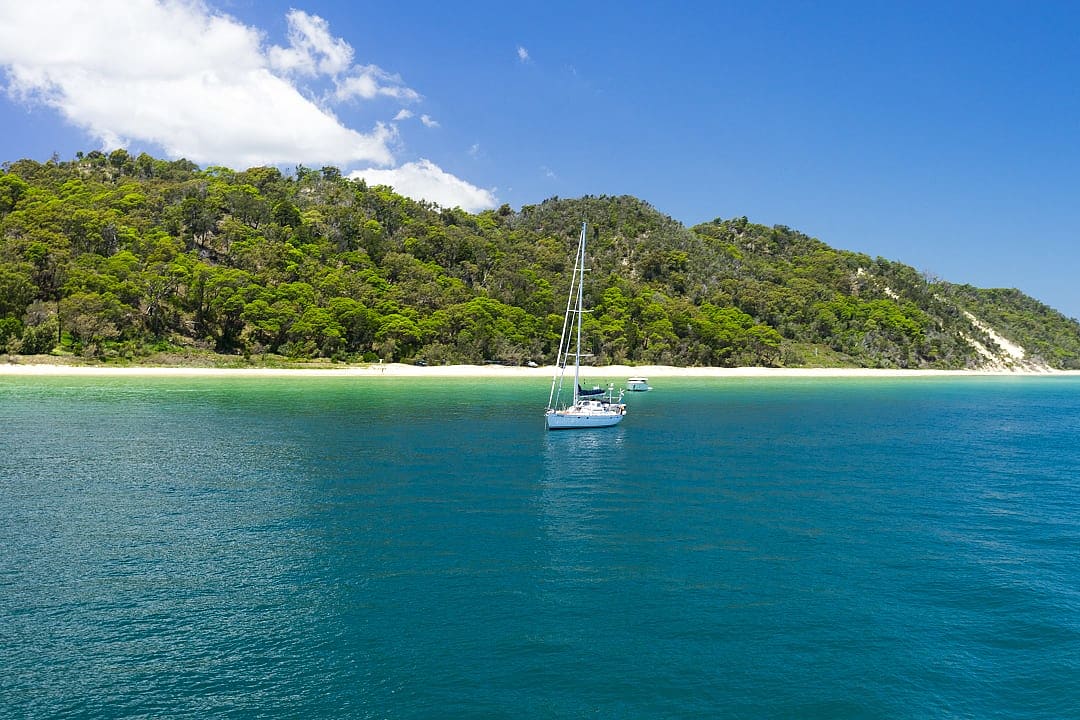 A private yacht charter in the serene waters of Moreton island, Australia.
