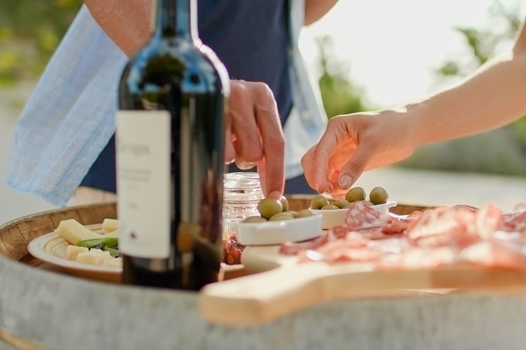 A wine tasting in Italy paired with traditional local foods.