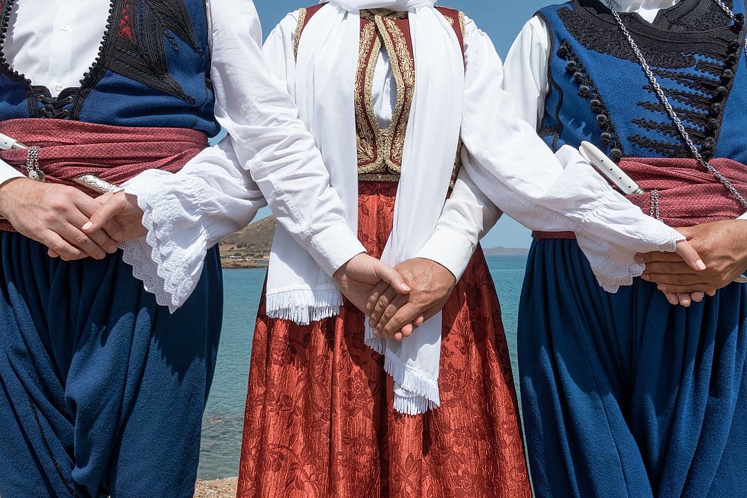 Cretan dancers wearing traditional costumes in Crete, Greece
