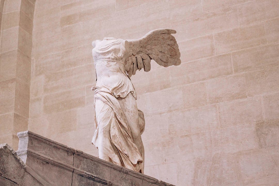 Winged Victory of Samothrace sculpture at the Louvre Museum in Paris