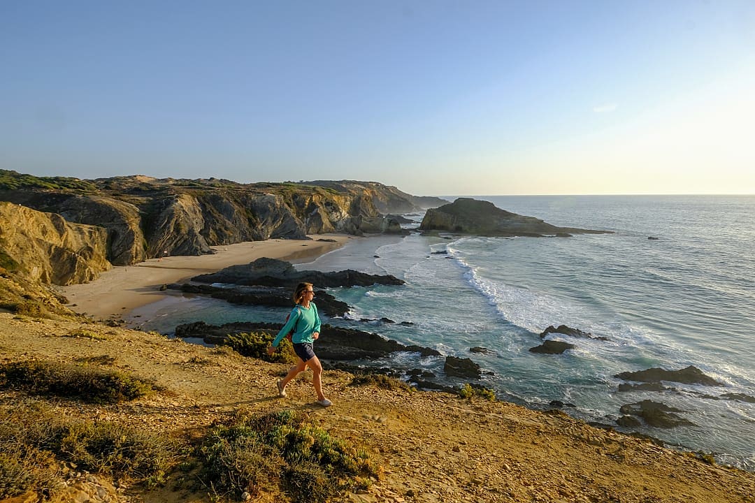 Woman on a morning coastal hike in the Alentejo region, Portugal