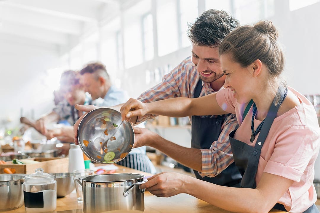 Couple enjoying a cooking class